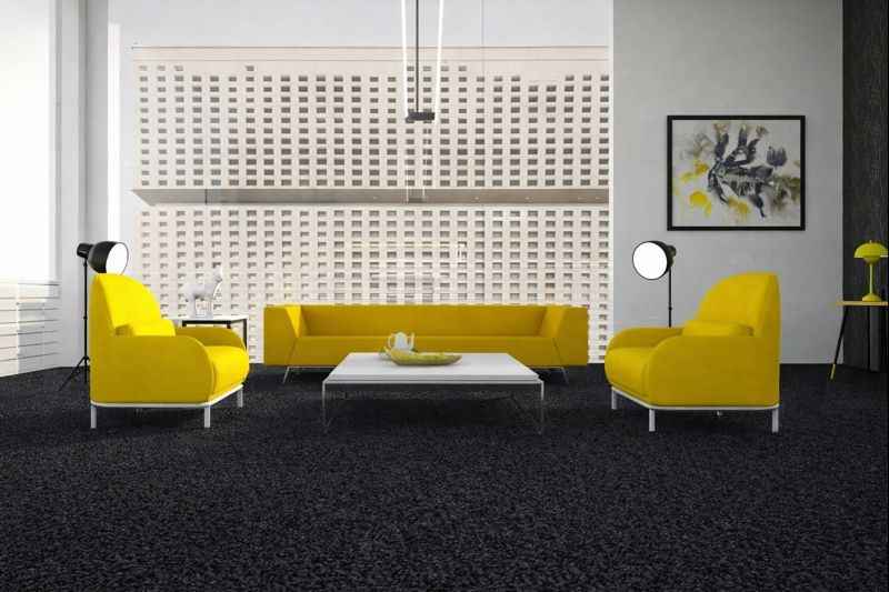 black carpet in living room with yellow sofa set